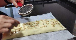 afegint els pinyons