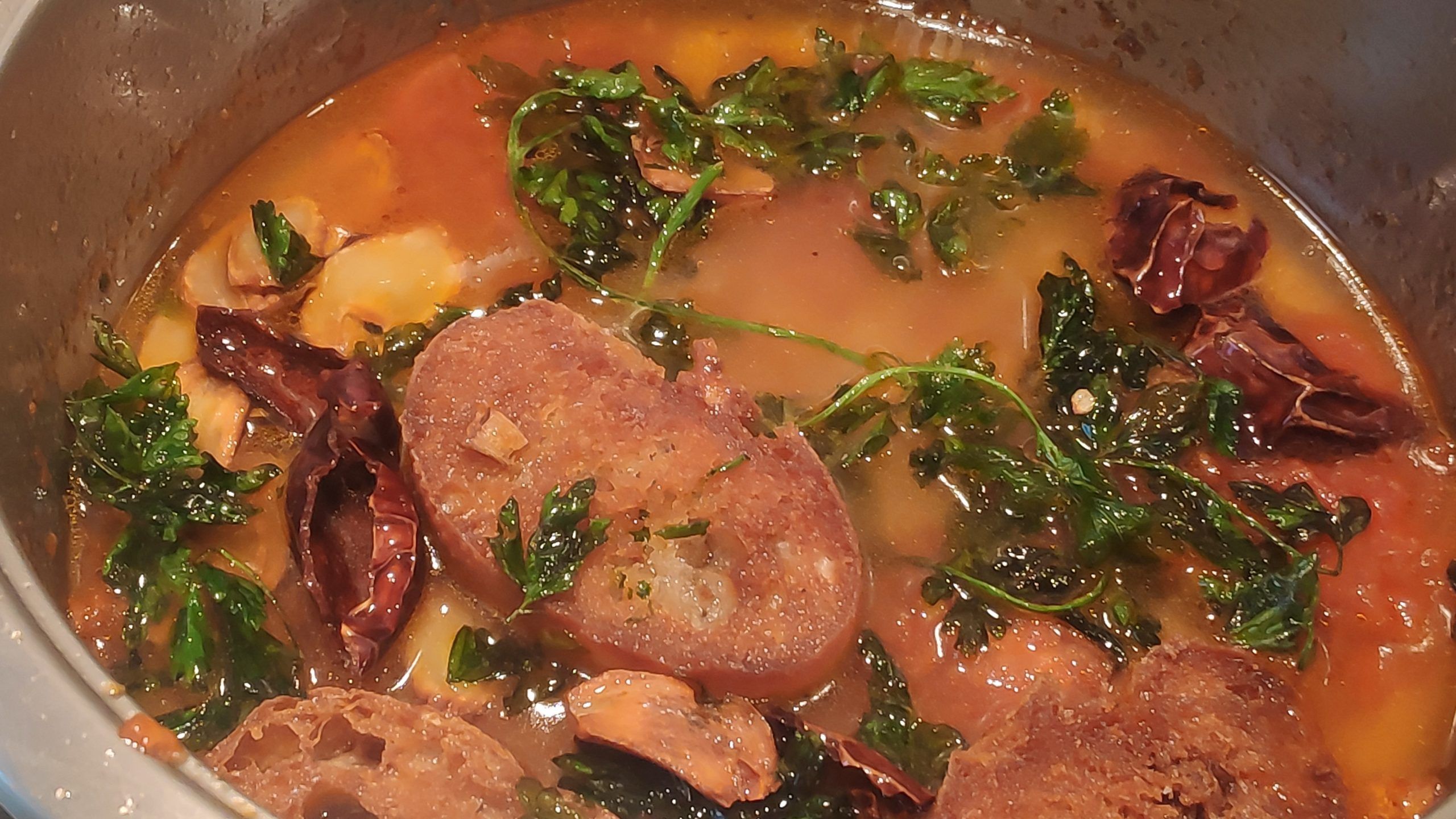 caldo o agua añadido a la cazuela peso cocinar el bacalao al ajo quemado