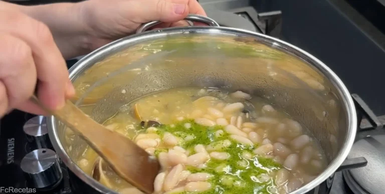 afegit a les fabes amb cloïsses la picada d'oli all i julivert
