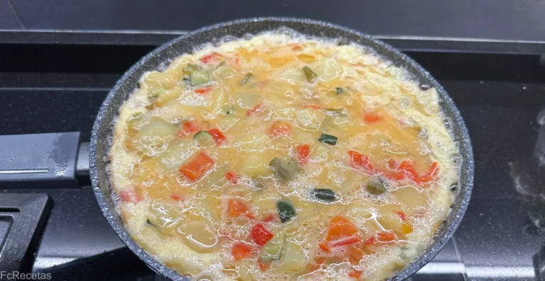 a la paella quallant la truita a la pagesa