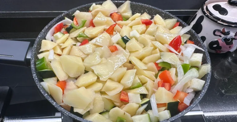 verdures a la paella escalfant elaboració de truita a la pagesa