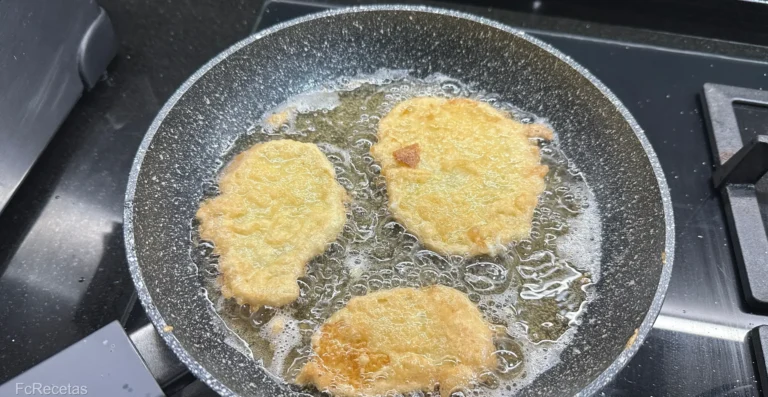 remenant en oli les patates pas de l'elaboració de la recepta patates a la importància