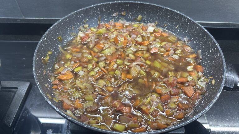 siguiente paso de la receta añadido el caldo o agua