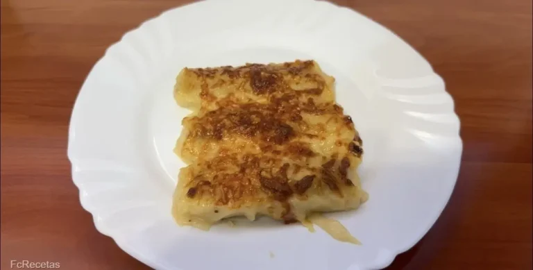 un plato de canelones caseros de carne