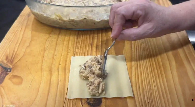 formandolos canelones con su relleno